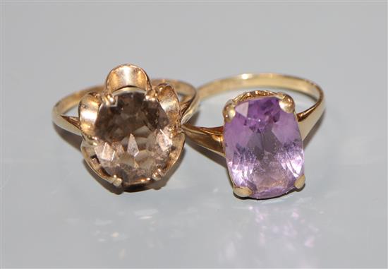 A 9ct gold and smoky quartz cocktail ring and a similar amethyst ring.